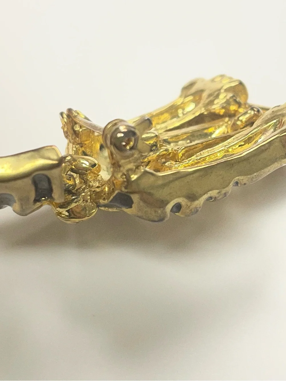 Vintage Articulated Gold-tone Prowling Panther Brooch with Green Eyes